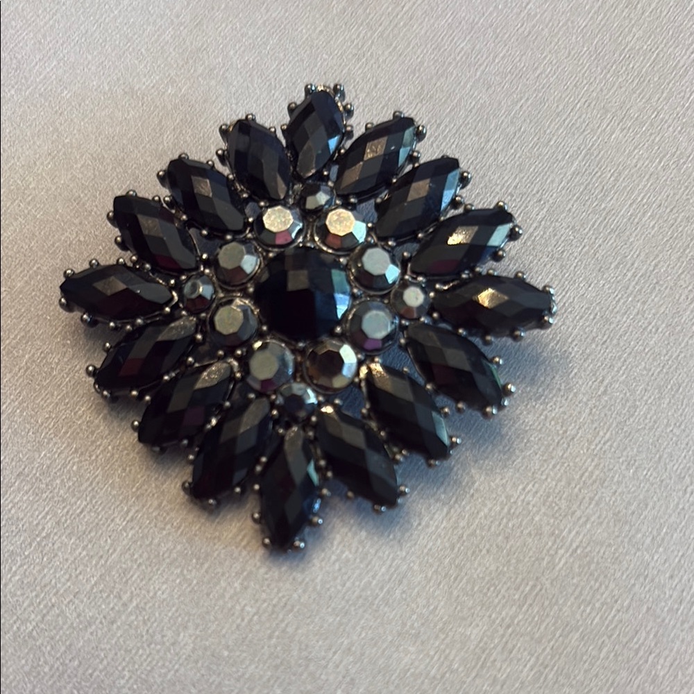 Black Crystal Starburst Brooch with Dimensional Design